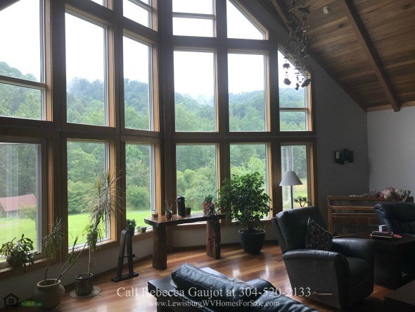  Country Properties in Renick WV - Endless fun and entertainment await you and your loved ones at the spacious family room of this Renick WV country home for sale. 