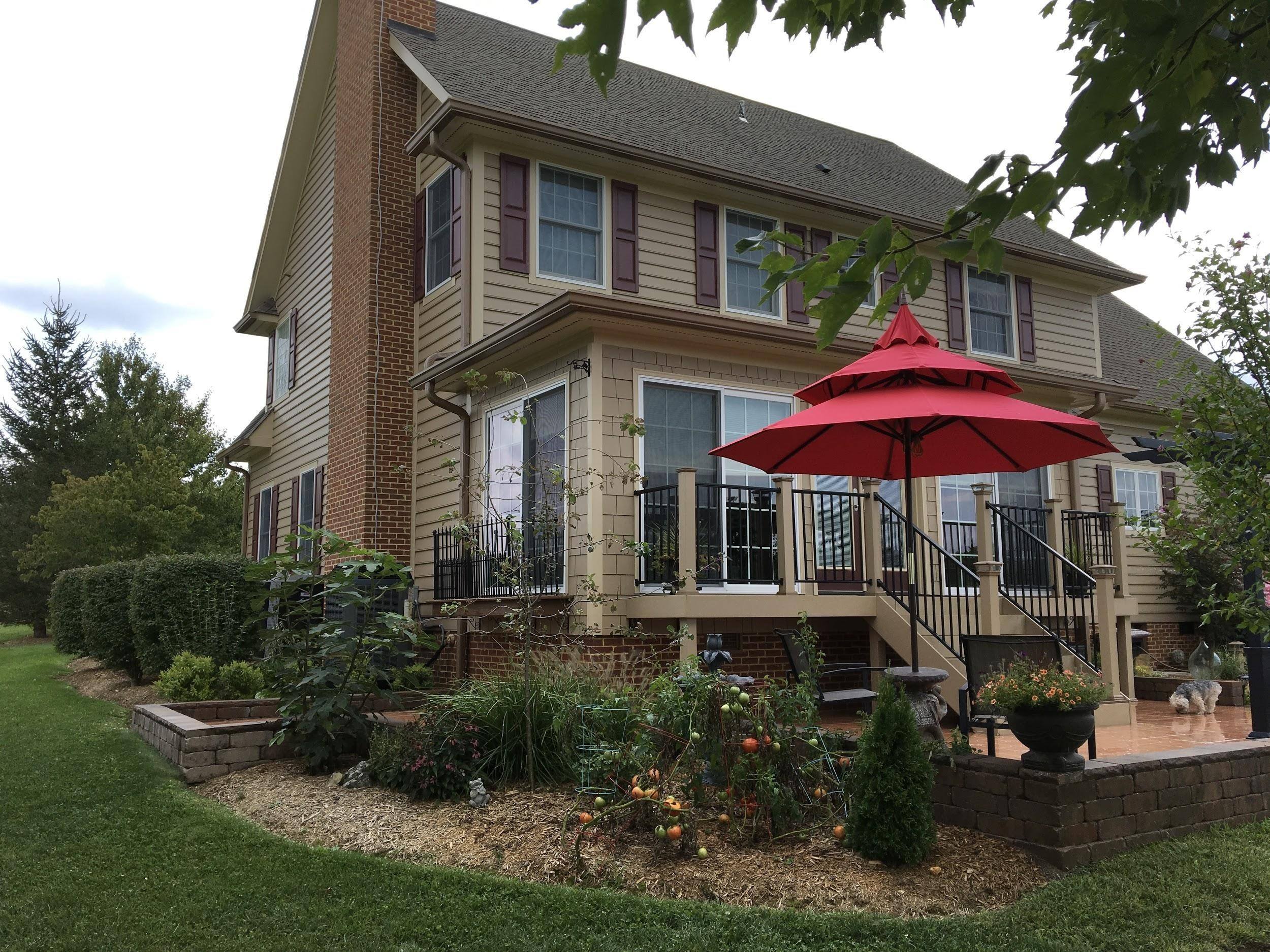 tiled patio and 3 Juliet balconies house Lewisburg WV Homes for Sale