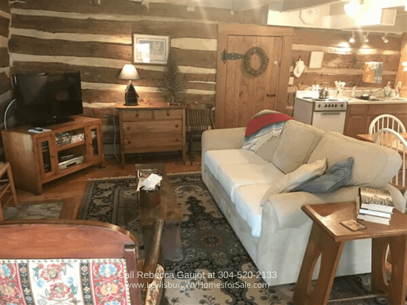 Historic Homes in White Sulphur Springs - Enjoy the rustic elegance of the fully renovated log cabin in this historic property for sale in White Sulphur Springs WV. 