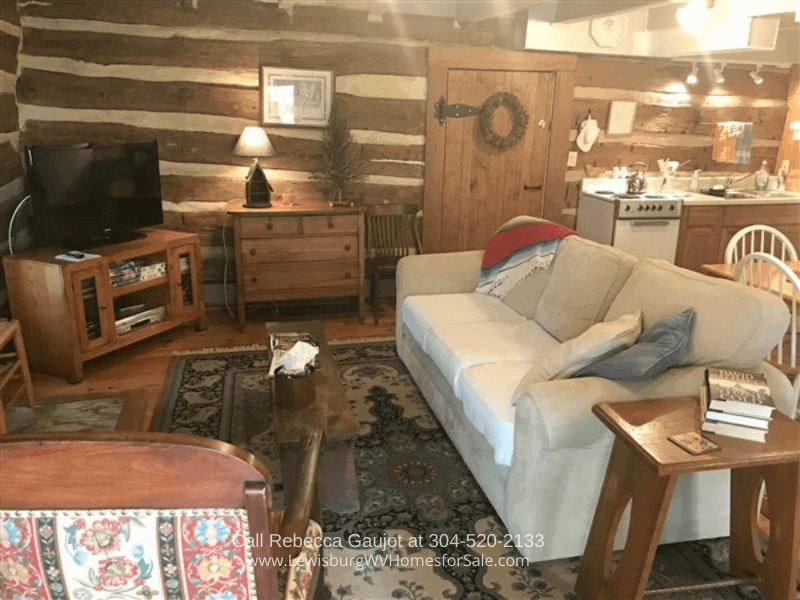 Historic Homes in White Sulphur Springs - Enjoy the rustic elegance of the fully renovated log cabin in this historic property for sale in White Sulphur Springs WV.